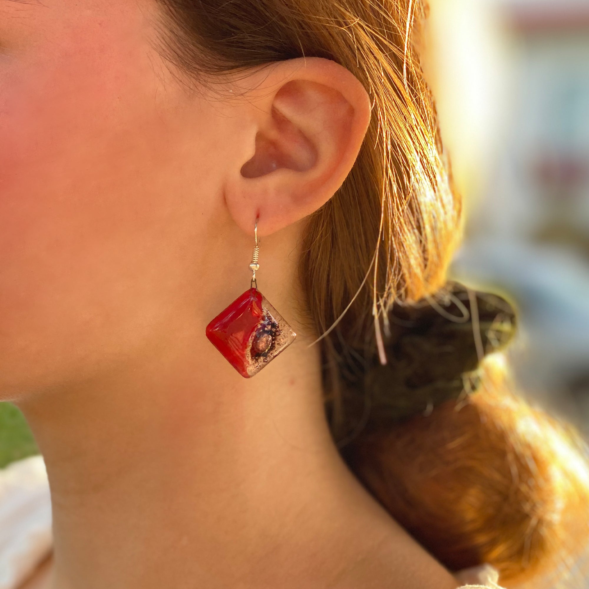 Handmade square glass dangle earrings from Fair Trade group in Chile